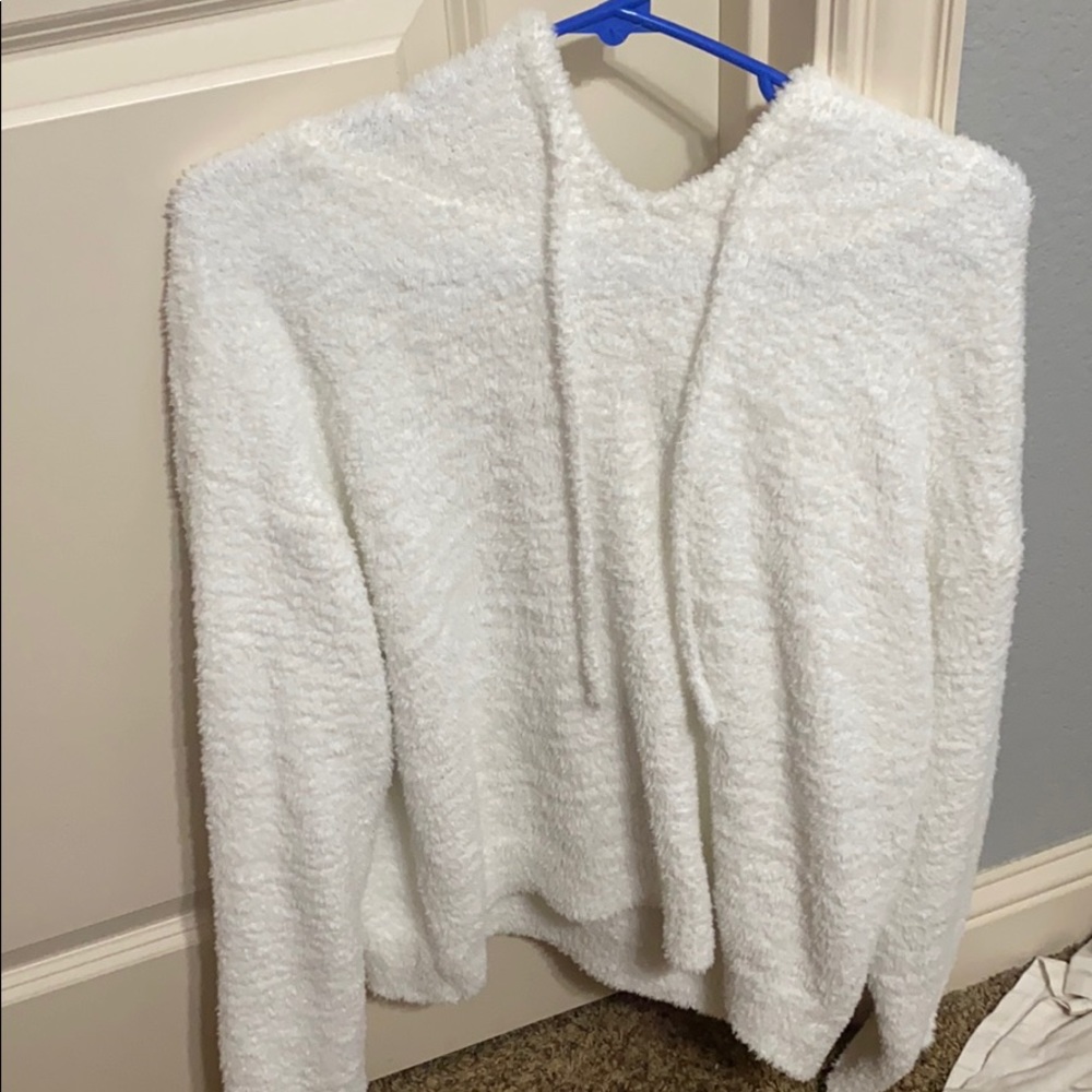 white fuzzy sweater